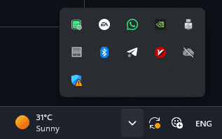 The MySQL Tray Controller icon, shown red for stopped, sitting among other ordinary system tray icons on a Windows taskbar